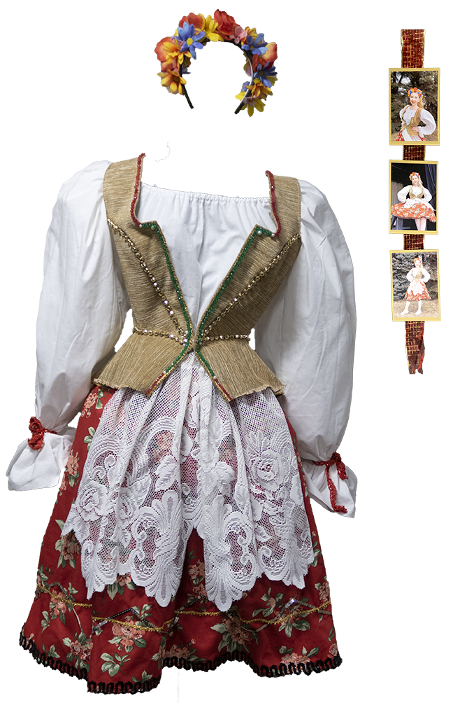 Traditional Polish dress with flower headband.