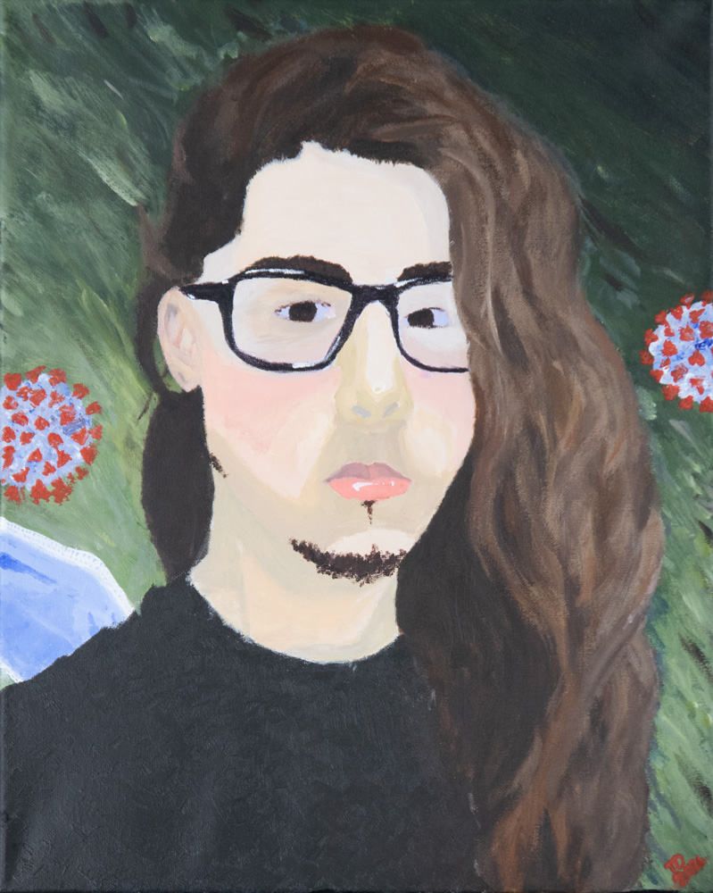 A young man looks at the viewer. He has long brown hair, glasses, and a goatee. In the background are virus particles.